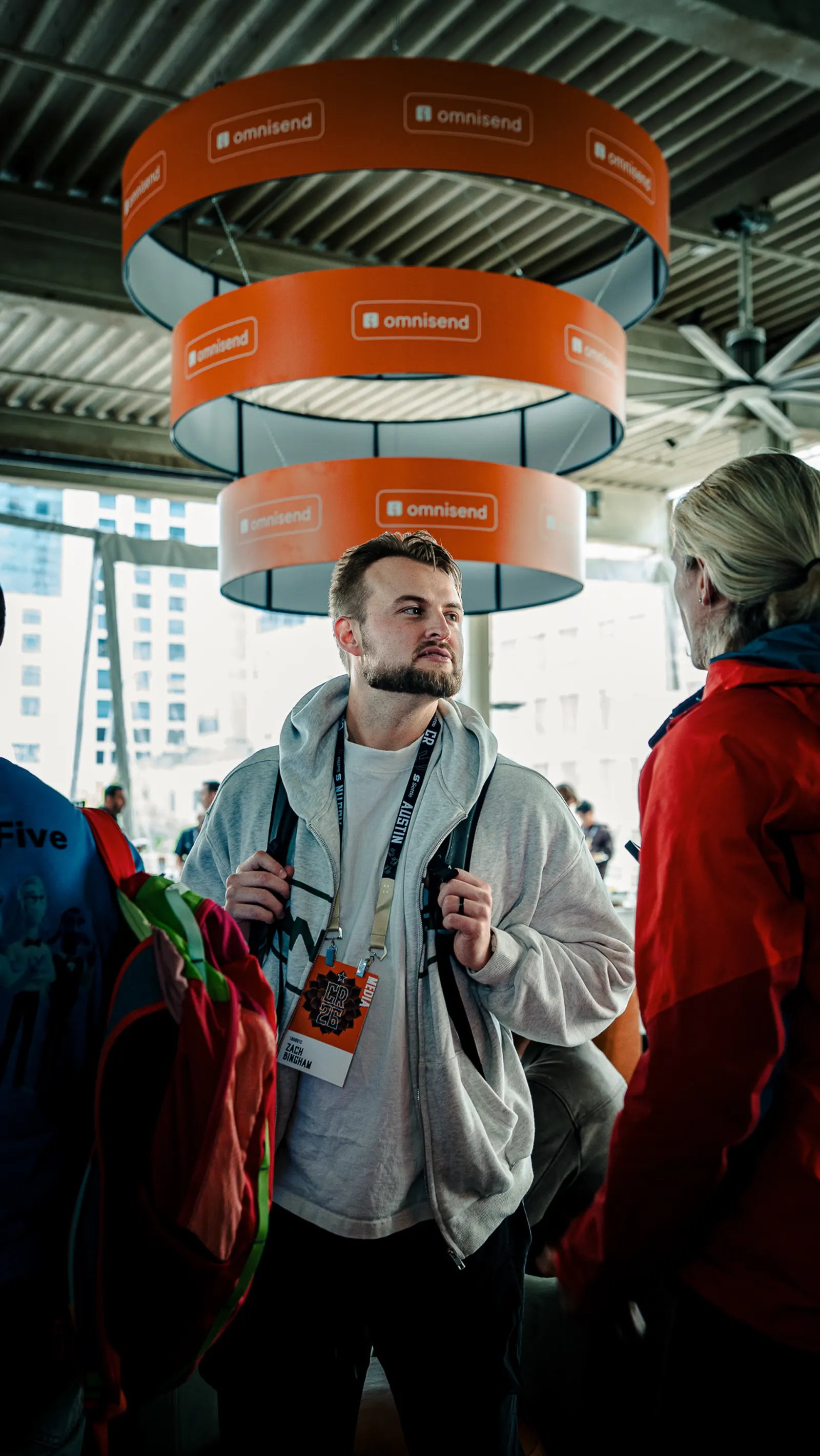 A smiling attendee on the rooftop