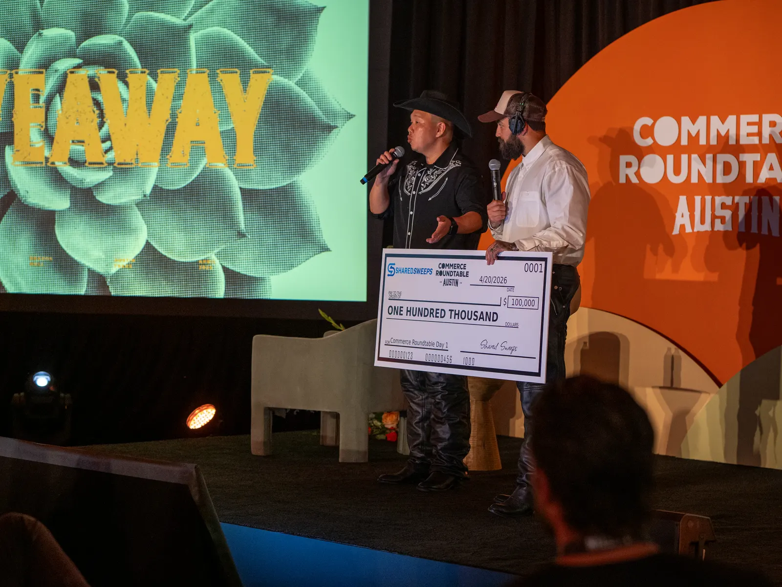 A big check giveaway on stage